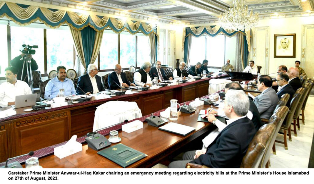 Caretaker PM seeks plan for reduction in inflated power bills within 48 hours