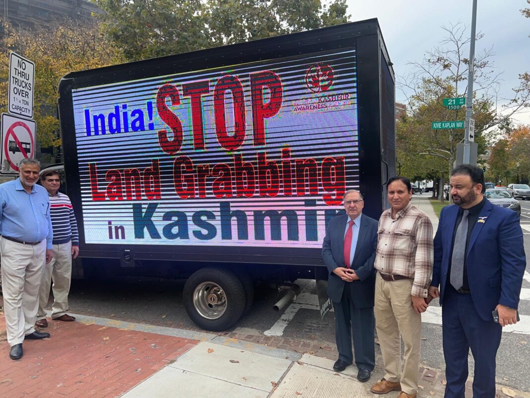 Digital trucks flash messages: India: Stop Land Grabbing in Kashmir